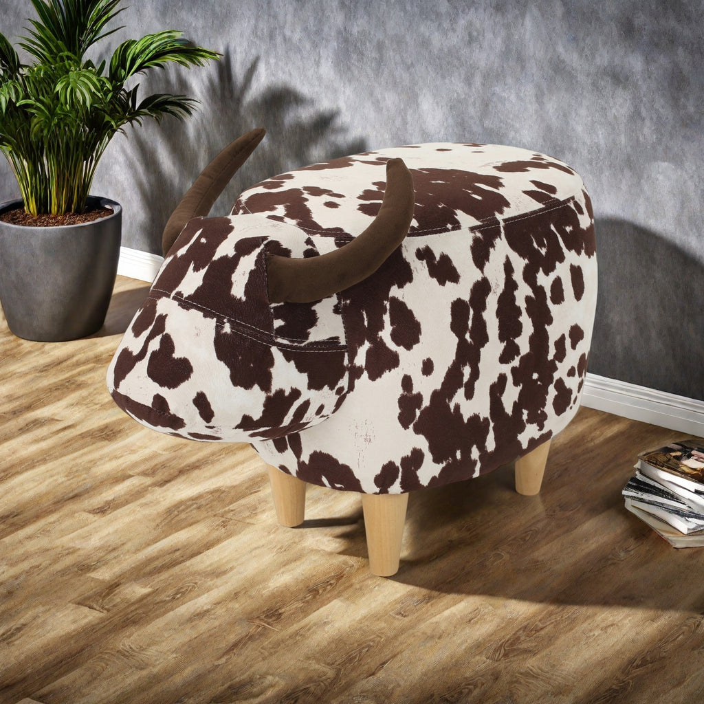Cow-Shaped Modern Ottoman Footstool in Brown and White Fabric with Velvet Horns, Birch Legs, 25.25 x 14.00 x 16.75 inches - Grand Goldman Shop