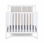 Connelly Mini Crib With Mattress Pad White/Rockport Gray | Premium Home Decor - Grand Goldman