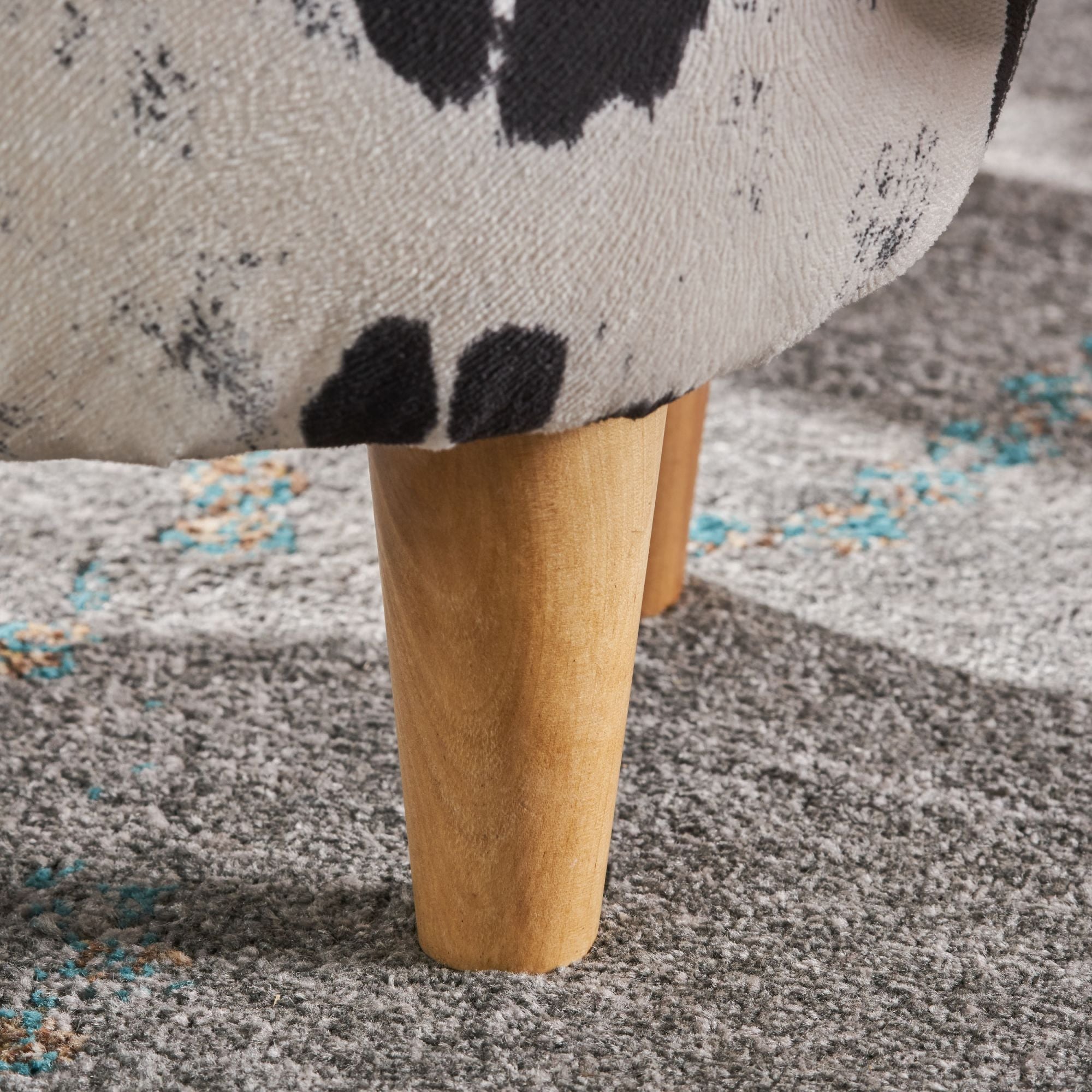 Cow-Shaped Ottoman Footstool, Black and White Modern Accent Stool with Velvet Horns, Fabric Body, Birch Legs - Grand Goldman Shop