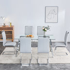 A modern minimalist rectangular glass dining table with tempered glass tabletop and silver metal legs, suitable for kitchens, restaurants, and living rooms,63'*35.4'*30' - Grand Goldman Shop