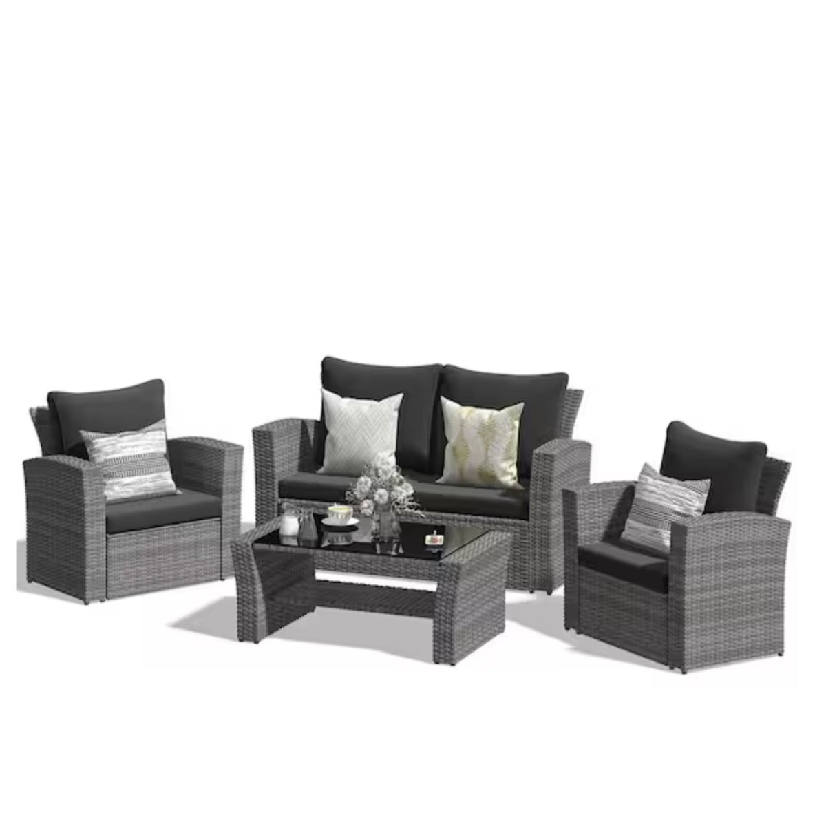 Moderne 4-teilige Loungegruppe aus Polyrattan mit gehärteter Glasplatte und schwarzen Auflagen in Schwarz-Braun