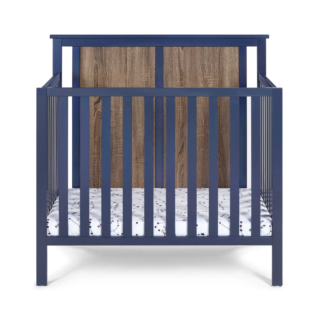 Connelly Mini Crib With Mattress Pad Midnight Blue/Vintage Walnut - Grand Goldman