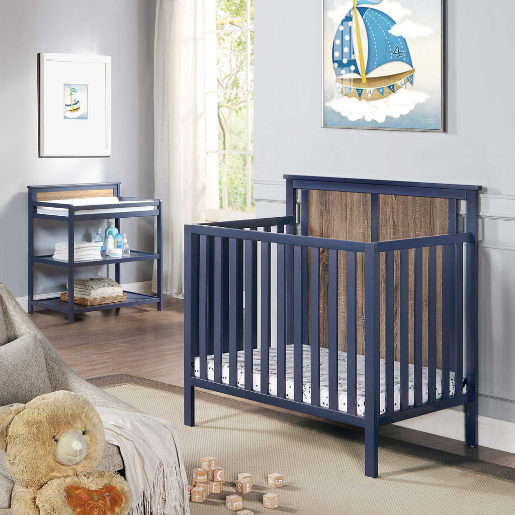 Connelly Mini Crib With Mattress Pad Midnight Blue/Vintage Walnut | Premium Home Decor - Grand Goldman