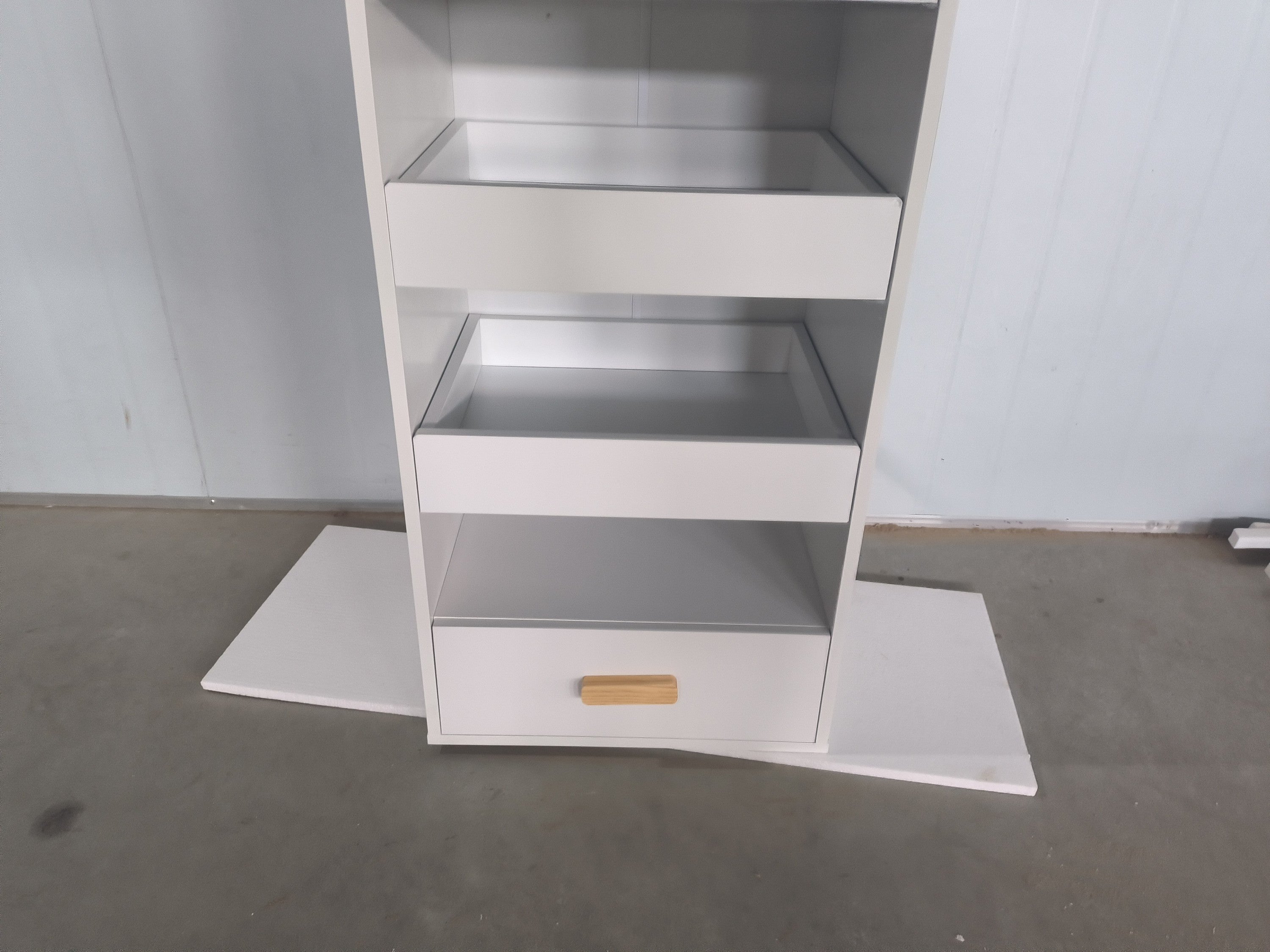 4-Tier Freestanding Bookshelf with 3 Sliding Drawers and 1 Bottom Drawer in White, Engineered Wood - Grand Goldman