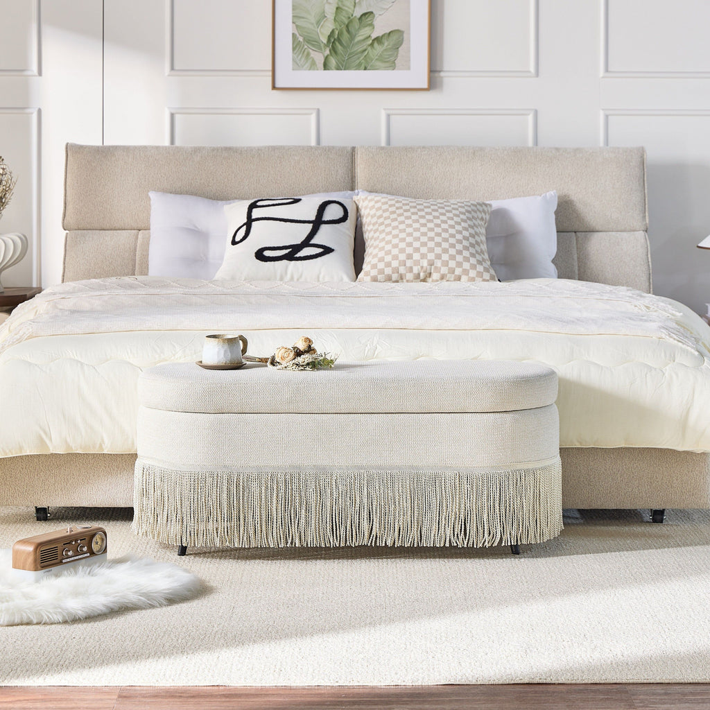 Oval Upholstered Storage Ottoman with Fringe Trim & Lift-Top Lid - 39'L x 16'W x 17'H, Multi-Functional Footrest & Hidden Storage for Living Room or Bedroom - Beige Fabric with Metal Frame - Grand Goldman Shop