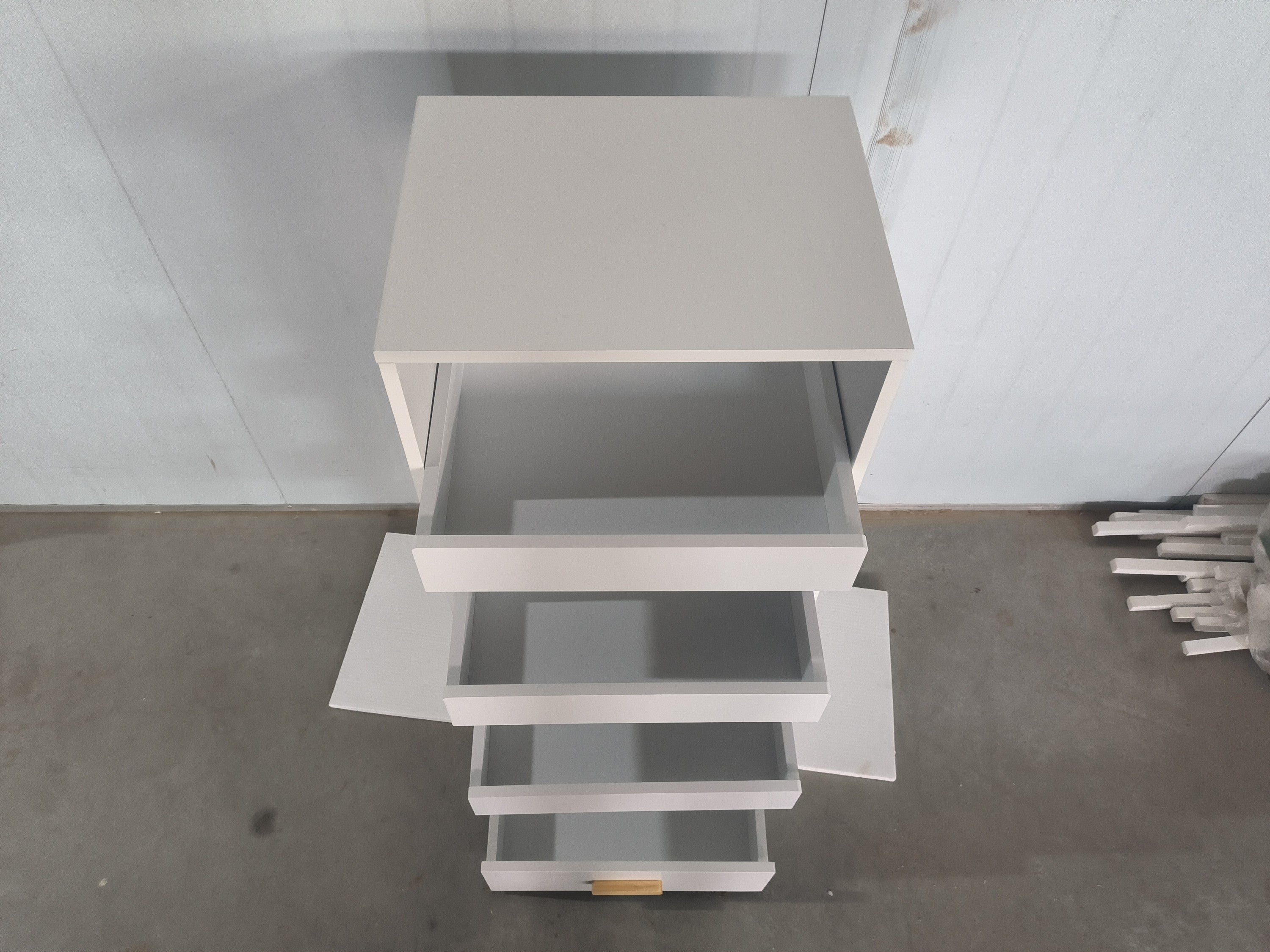 Stylish 4-Tier Freestanding Bookshelf with 3 Sliding Drawers and 1 Bottom Drawer in White, Engineered Wood - Available at Gra
