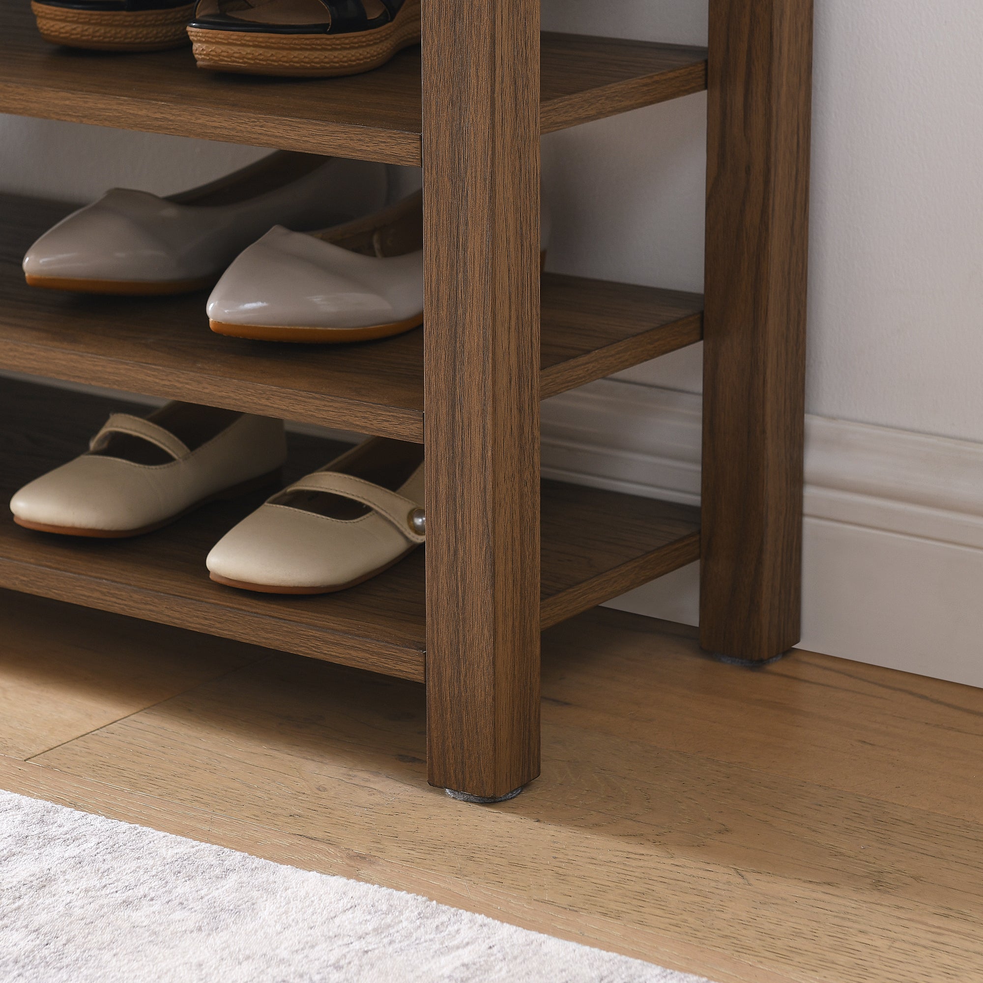A height-adjustable long shoe-changing bench,made of natural rubberwood,comes with a comfortable seat,concealed storage space and large storage compartments. features natural wood grain.Brown - Grand Goldman Shop
