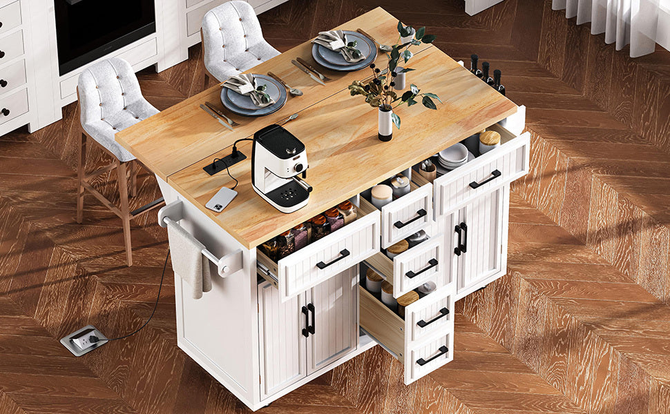 K&K 56.5'' Kitchen Island with Drop Leaf, Power Outlet, Embossed Vertical Stripe Rolling Kitchen Cart on Wheels with 4 Doors , 5 Deep Drawers and Adjustable Shelves, for Kitchen, Dining Room, White - Grand Goldman Shop