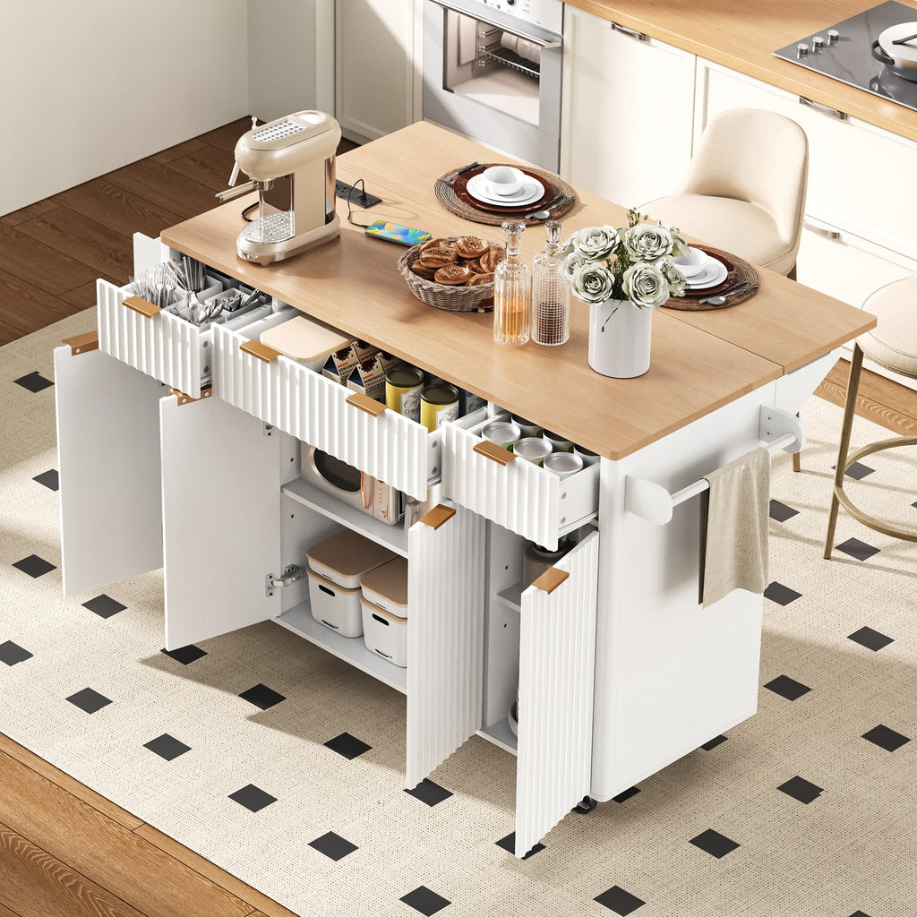 K&K Fluted Kitchen Island with Storage, 55.5' Kitchen Island with Drop Leaf, Power Outlet, 4 Doors and 3 Drawers, Rolling Island Table with Wood-grain Top, Curved Edge for Kitchen,Dining Room White - Grand Goldman Shop