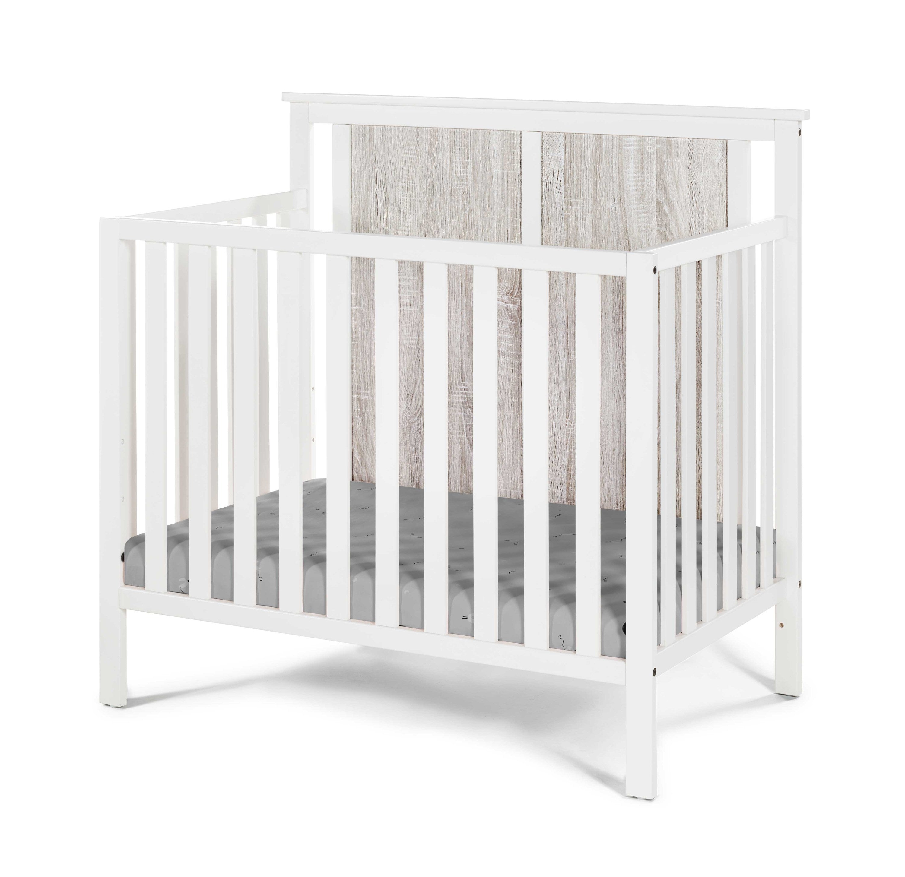 Connelly Mini Crib With Mattress Pad White/Rockport Gray - Grand Goldman