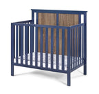 Connelly Mini Crib With Mattress Pad Midnight Blue/Vintage Walnut | Premium Home Decor - Grand Goldman